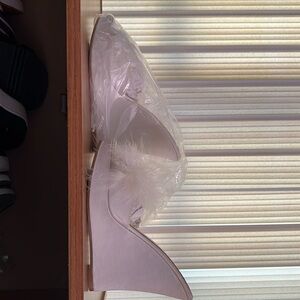 Lovely feathery Victoria Secret shoes.